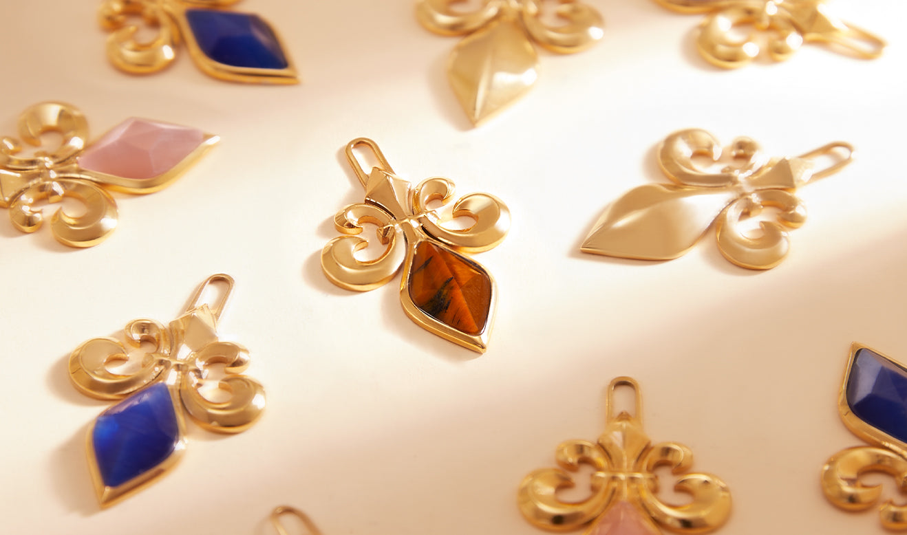 The Resilience Fleur-de-Lis Pendant Joins the Mvintage Reign Collection