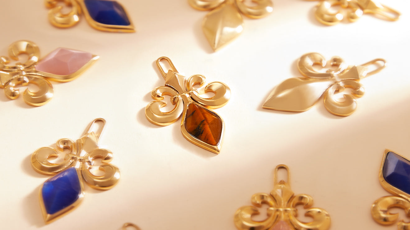 The Resilience Fleur-de-Lis Pendant Joins the Mvintage Reign Collection