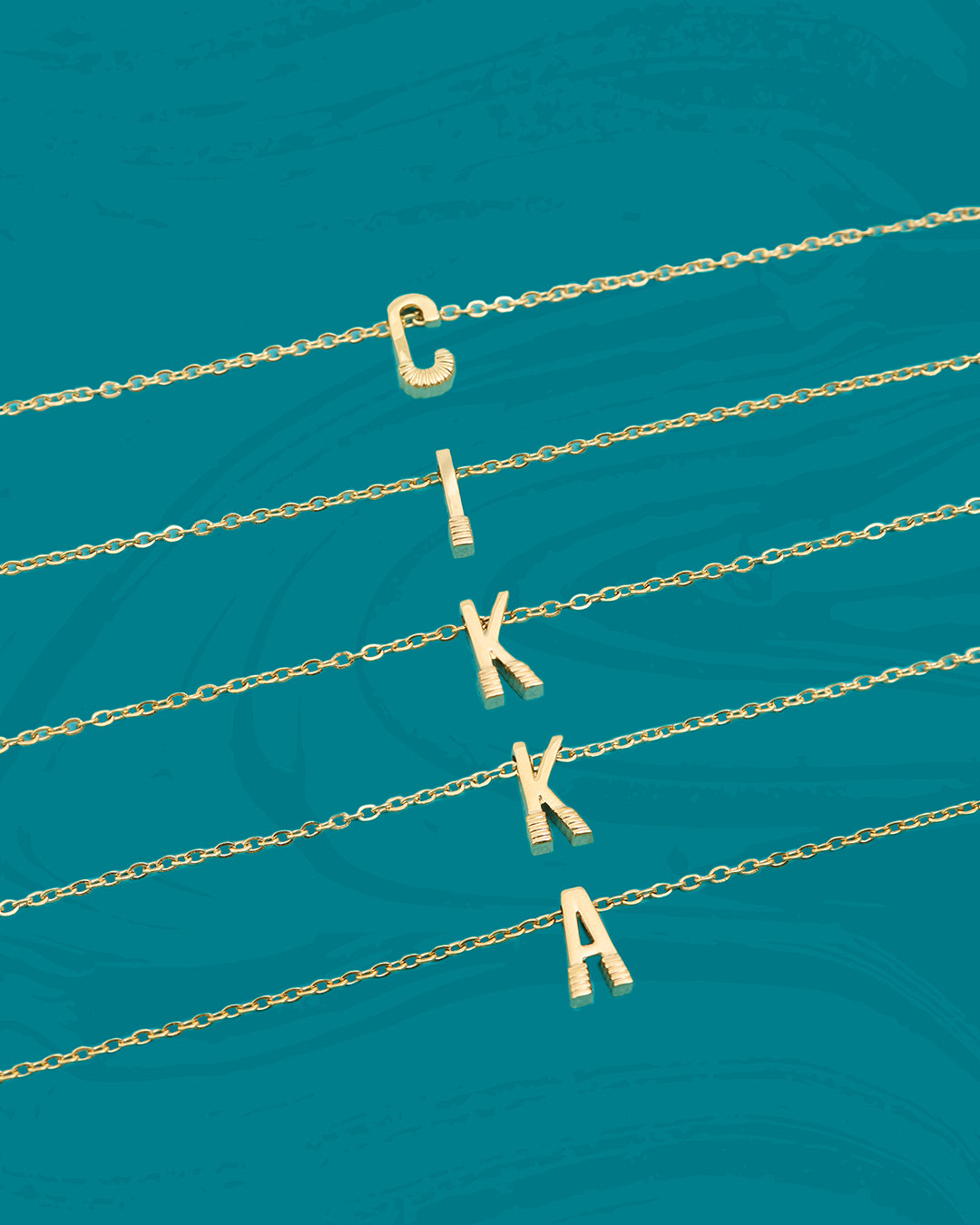 ĊIKKA INITIALS