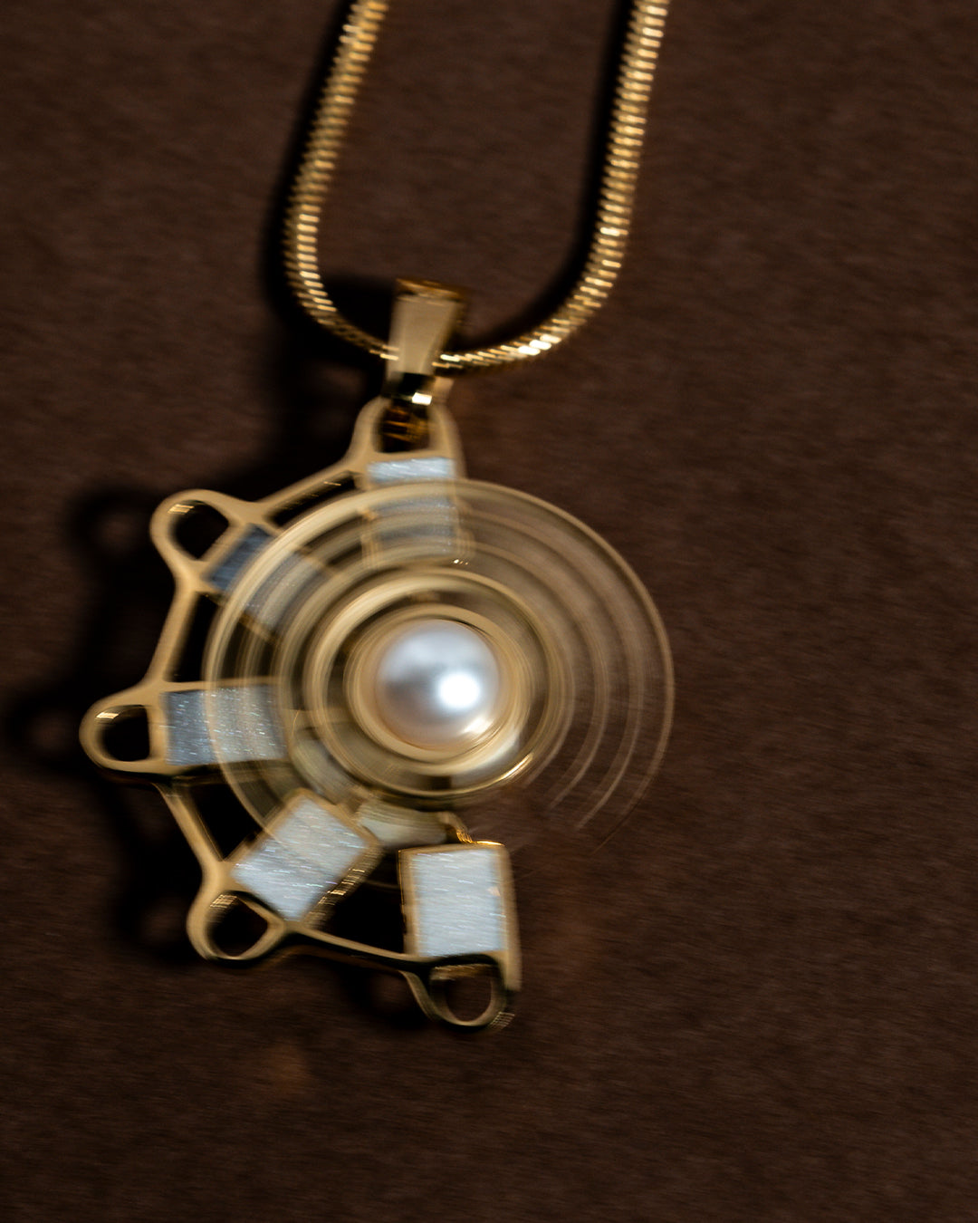 Mithna Rotating Pendant