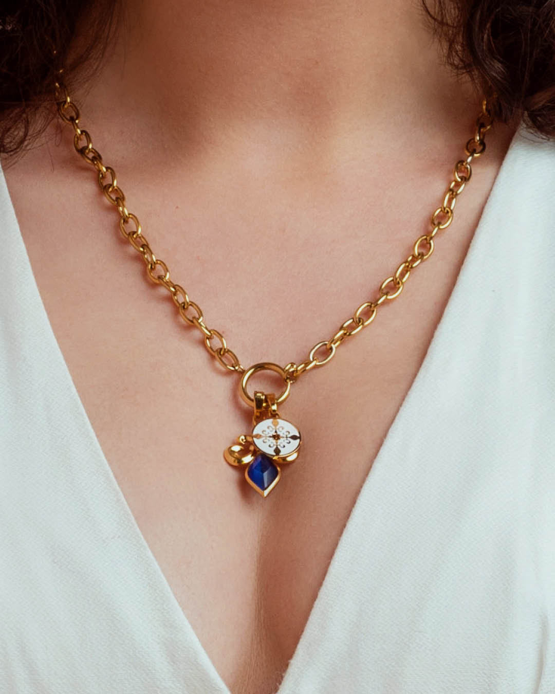 Perseverance Stone Blue Cateye Fleur de-Lis Pendant, Gold